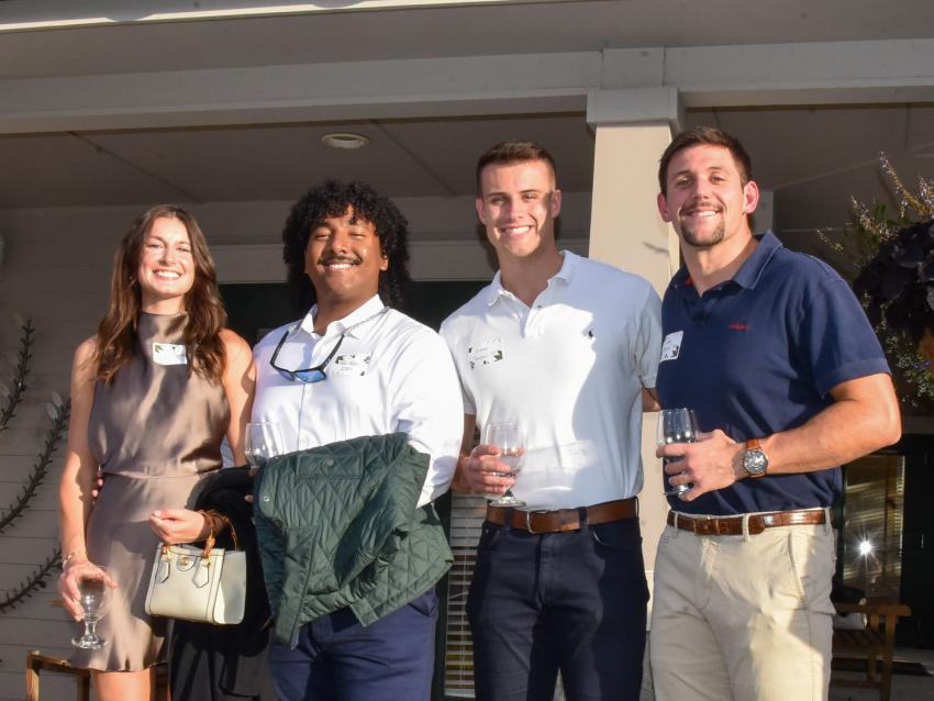VCOM-Virginia alumni posing for a photo during homecoming 2024