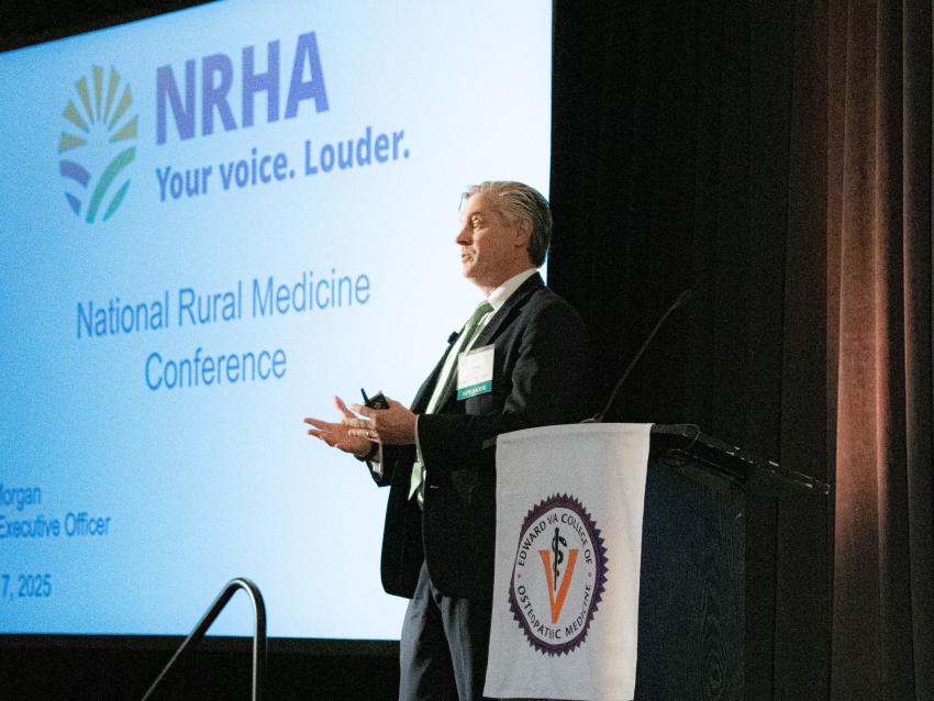 VCOM National Rural Medical Conference speaker addressing the attendees