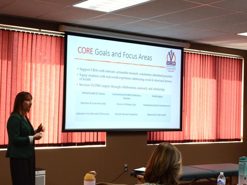 Jess Nicholson talking through slideshow information about CORE
