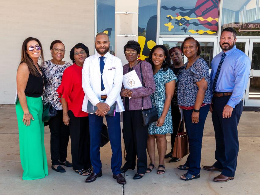 VCOM-Louisiana student with family