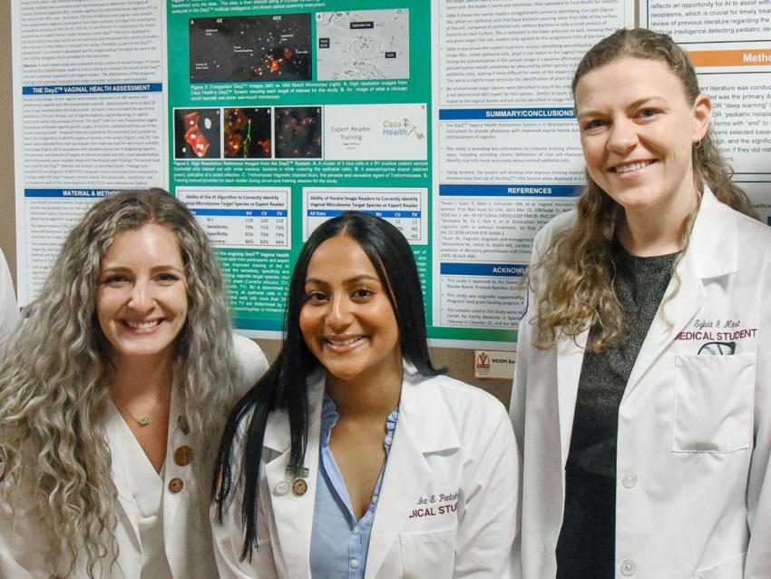 VCOM-Virginia students in white coats during research day