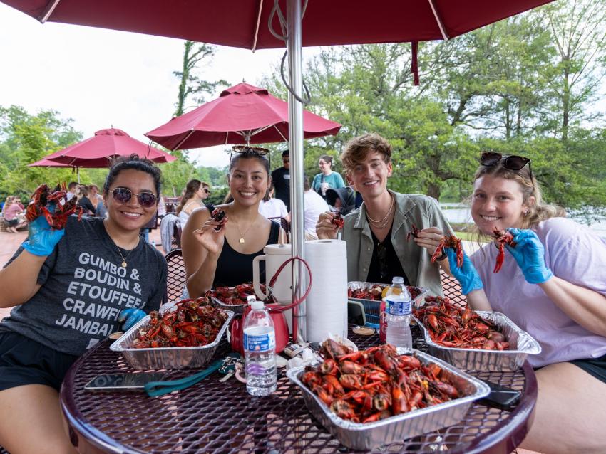 VCOM-Louisiana students enjoying crawfish boil