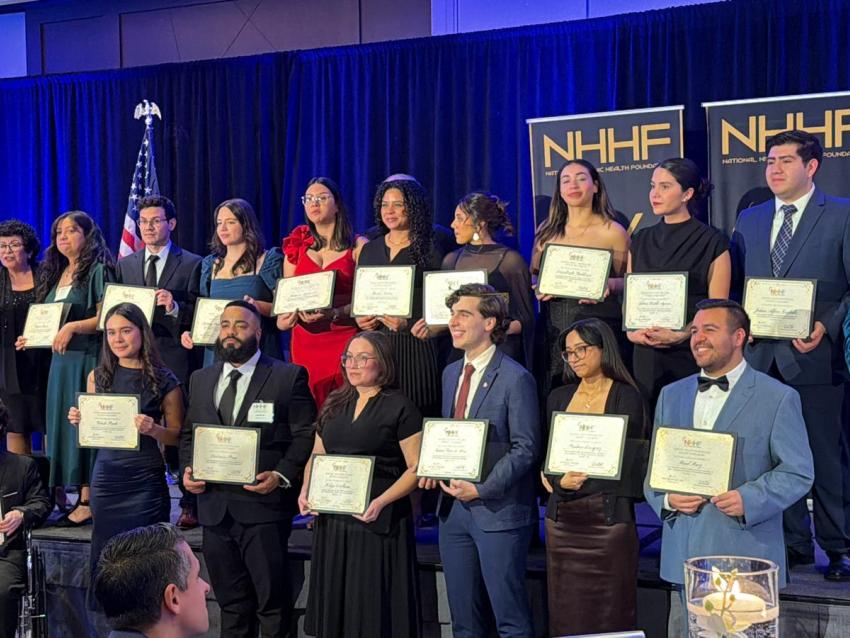 Celeste Prado and other scholarship award winners smiling