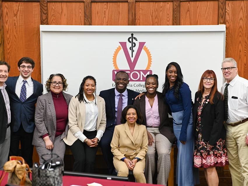 Maxine Lee, MD, MBA, FASA and members from VCOM-Virginia posing for a photo