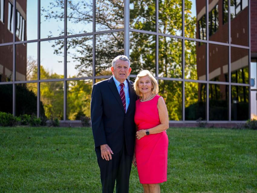 H. Pat and Nancy E. Artis standing in front of the New Health Sciences Education Building