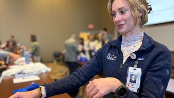 Person working and learning during the stop the bleed training session