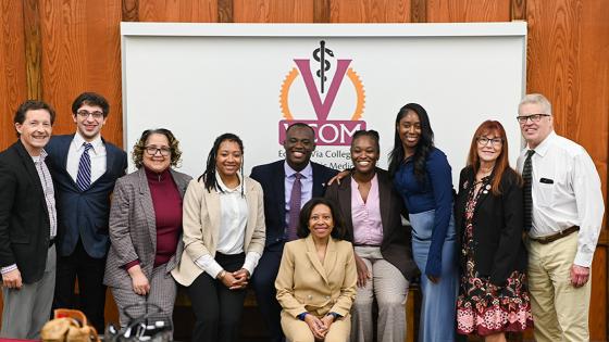 Maxine Lee, MD, MBA, FASA and members from VCOM-Virginia posing for a photo