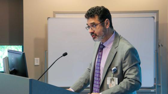 Hanna Sahhar, MD speaking at a podium